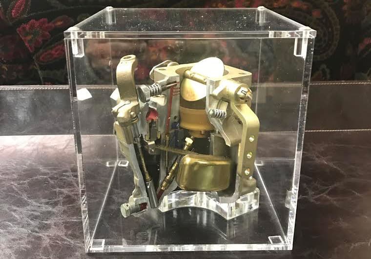 A simple display case made for an engine part